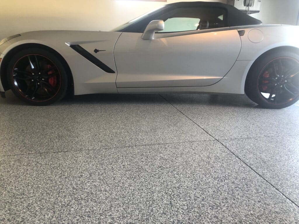 Corvette in concrete coated garage floor